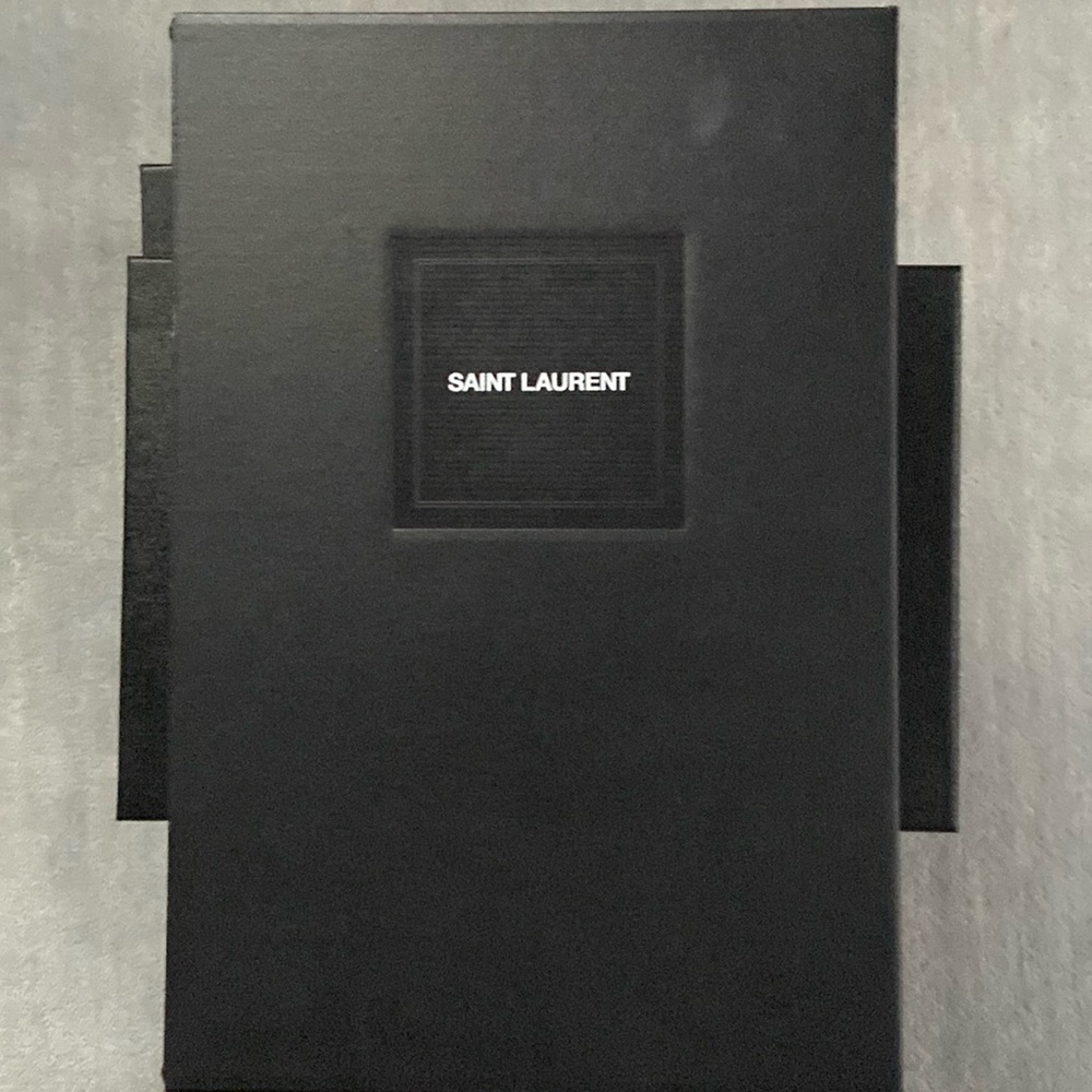 Box in excellent y shape from Saint Laurent.  Original paper inside and labels.